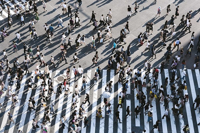 photo of a busy pedestrian crossing from above